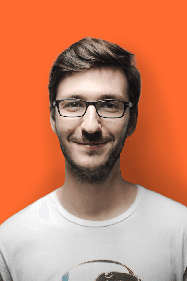 smiling man in glasses